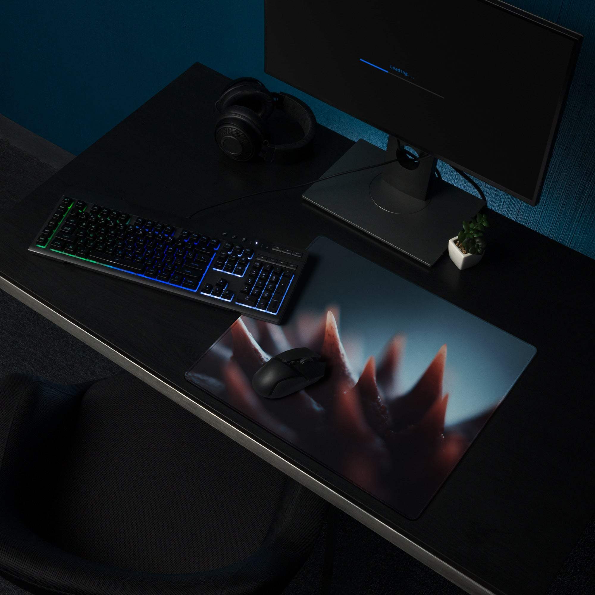 Dark red black gaming mousepad with spiky claws texture and non-slip base