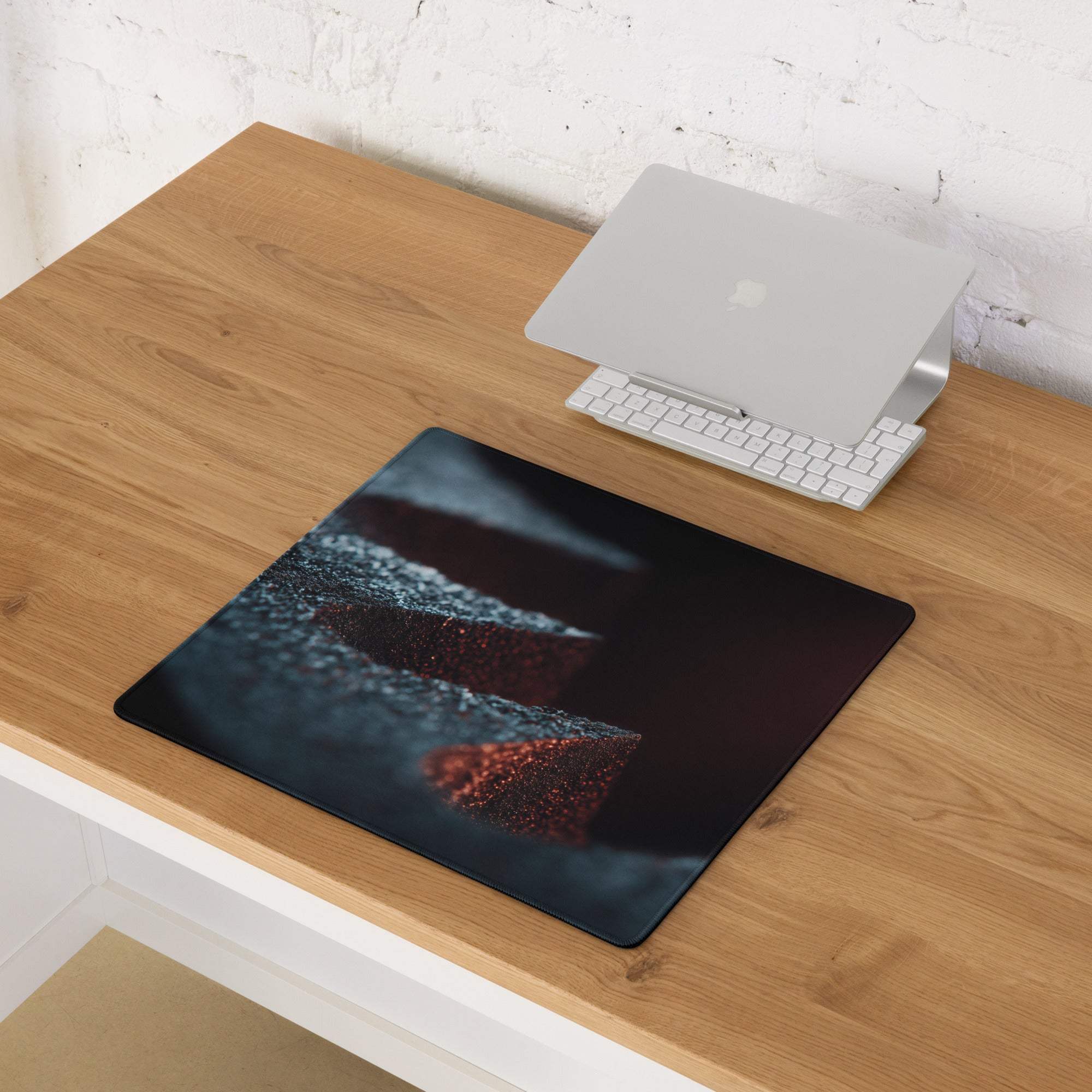 Premium Midnight Ember gaming mouse pad with red blue waves