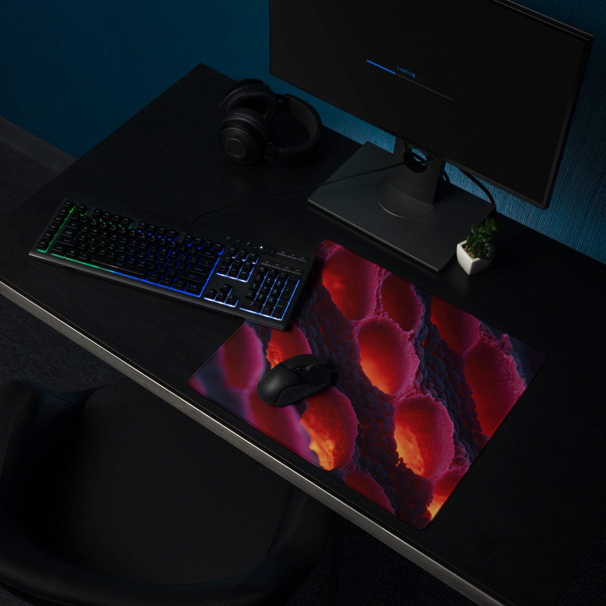 Large non-slip gaming mousepad in vibrant lava red and purple hues with glossy finish