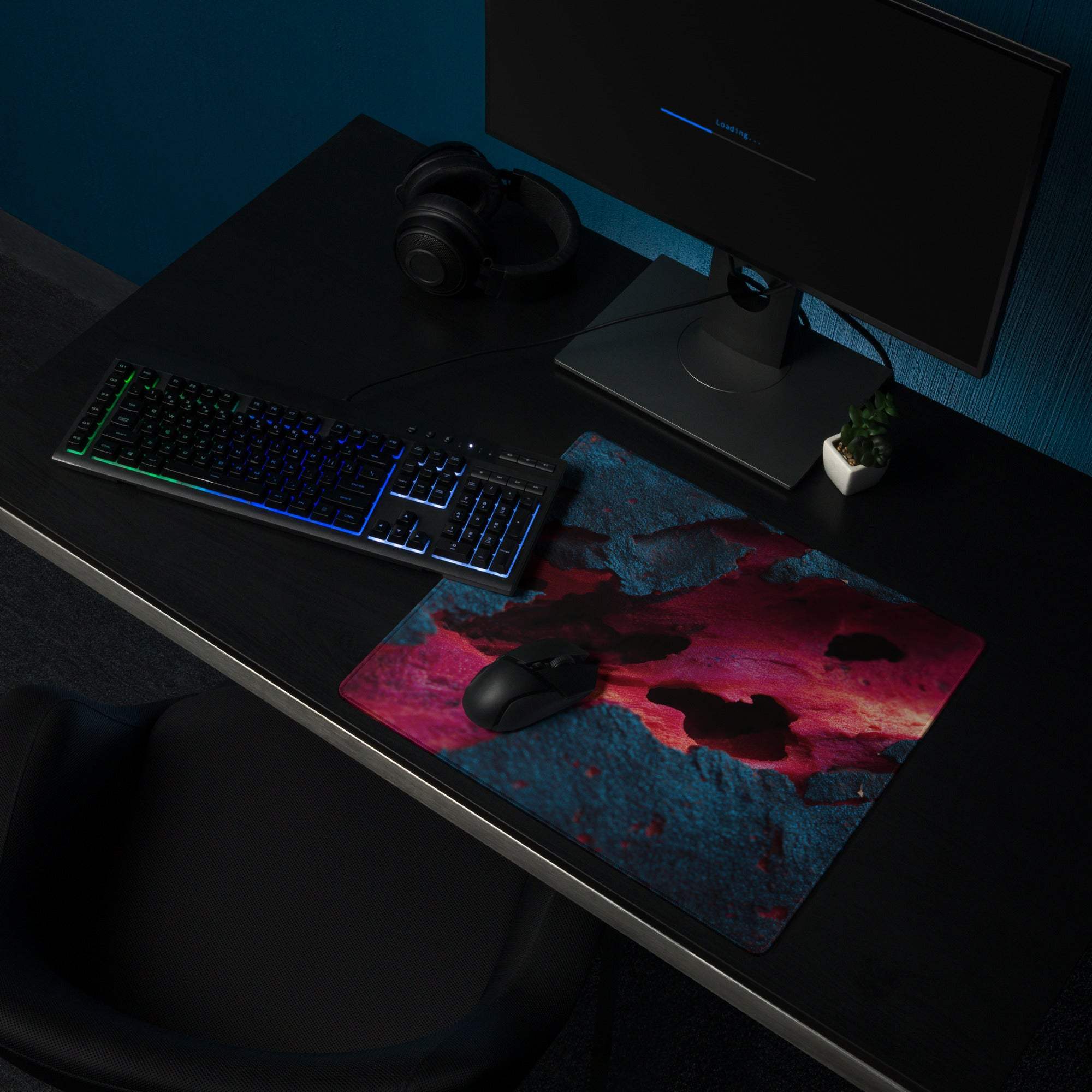 Vibrant red blue cosmic gaming mousepad with textured non-slip base