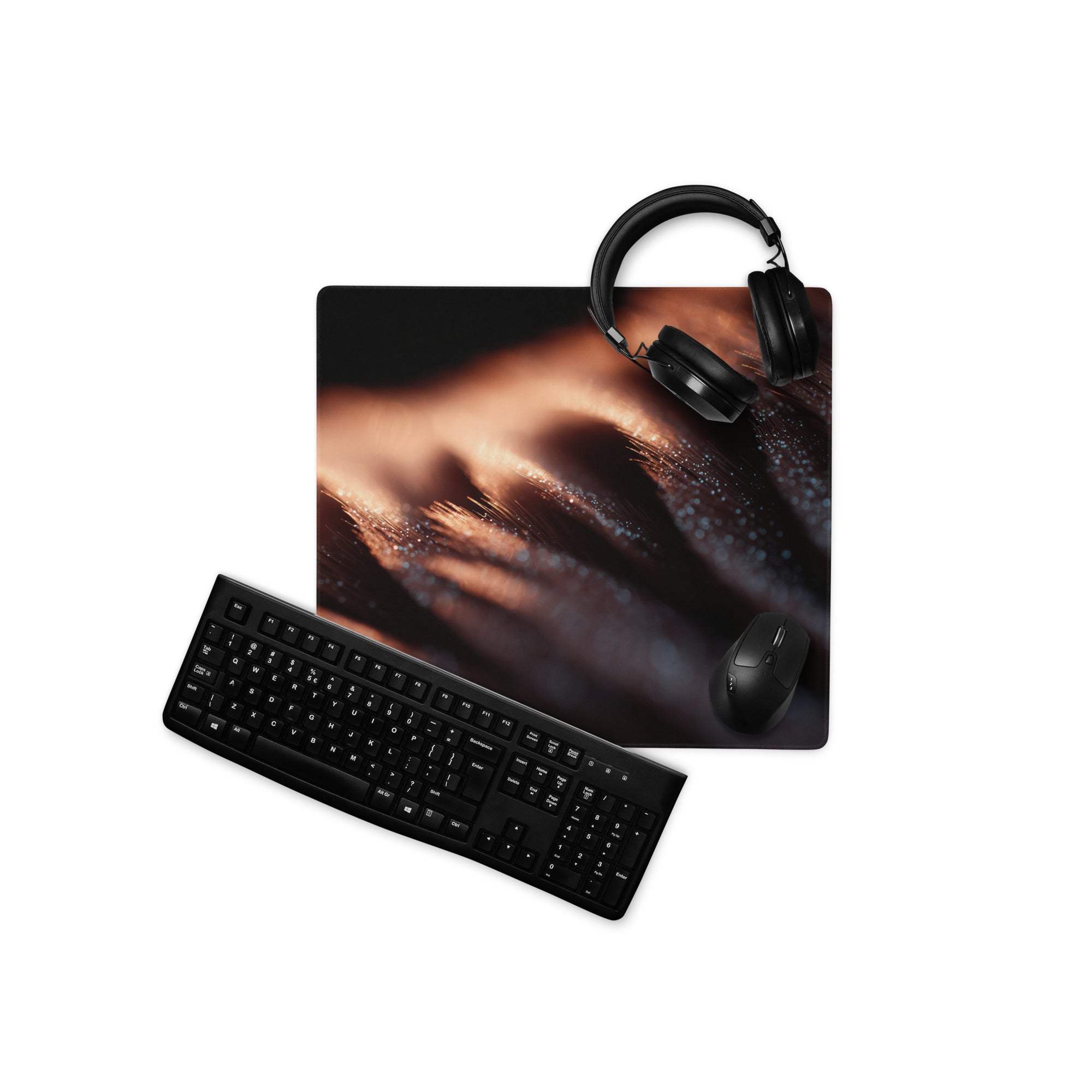 Black ergonomic keyboard on Premium Dark Ember gaming mouse pad