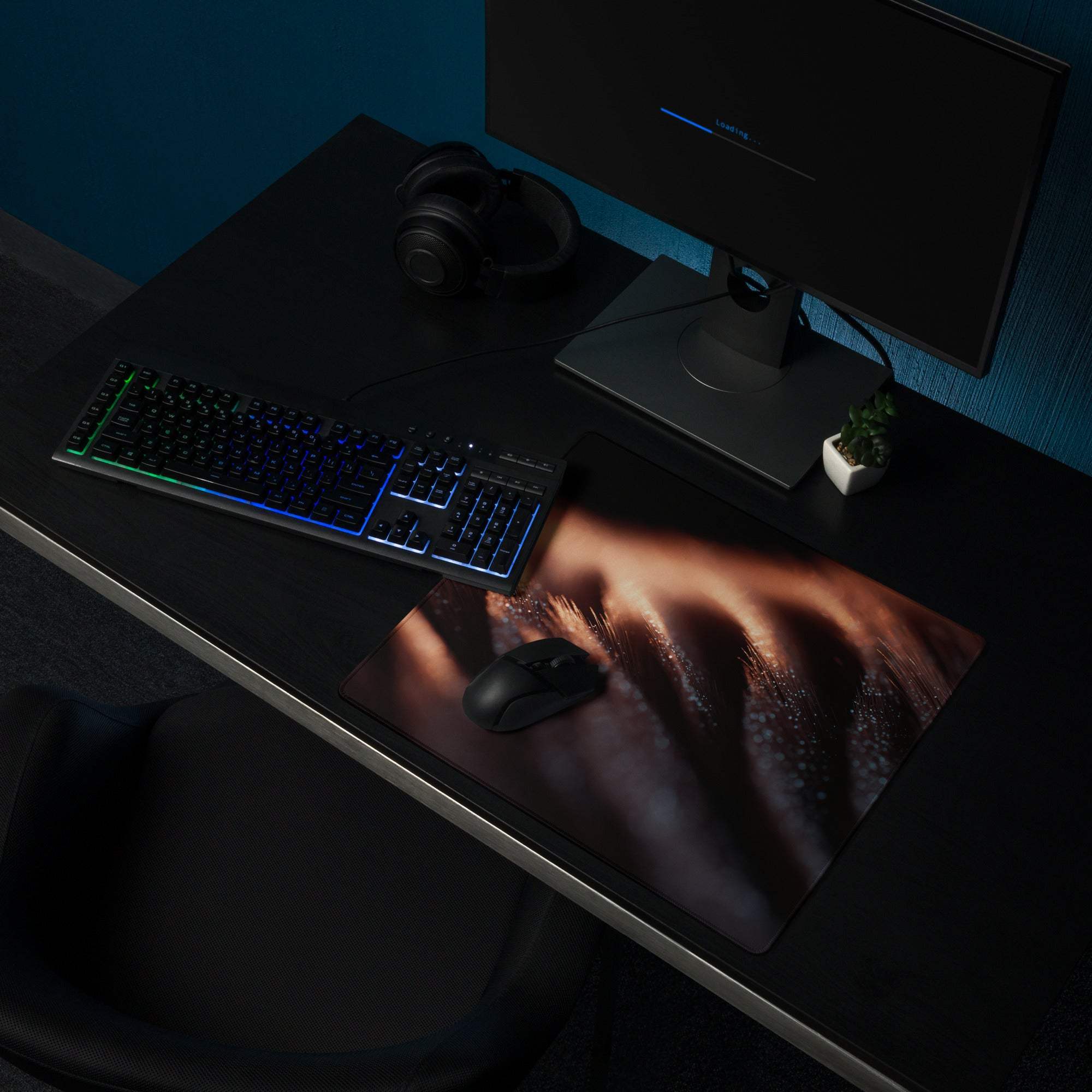 Black wireless mouse on Premium Dark Ember gaming mousepad