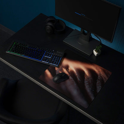 Black wireless mouse on Premium Dark Ember gaming mousepad
