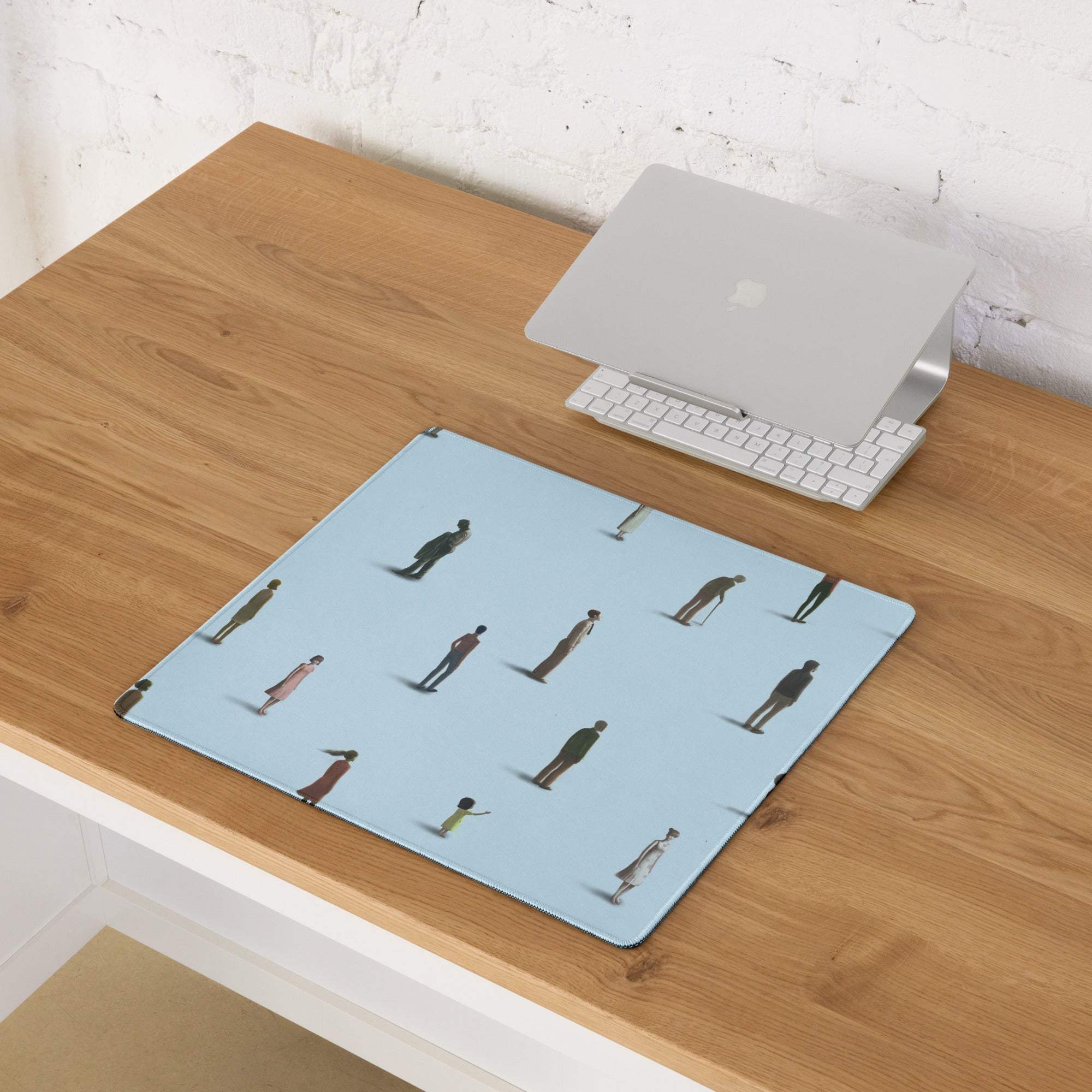 Light blue rectangular mousepad featuring colorful stylized human figures in various poses for a minimalist desk setup