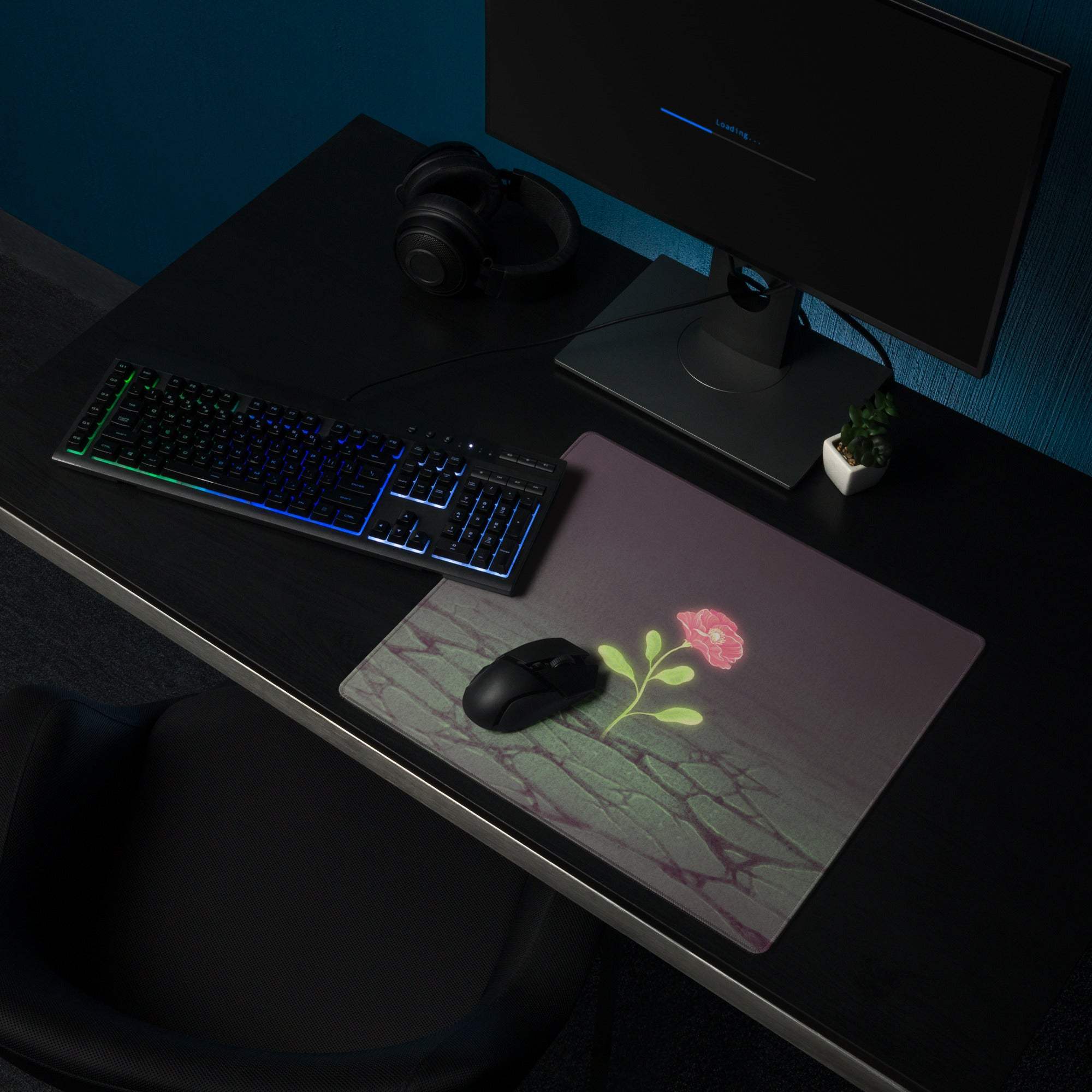 Floral rose gradient desk pad with a subtle marble texture pink flower green leaves on dark gray polyester mat