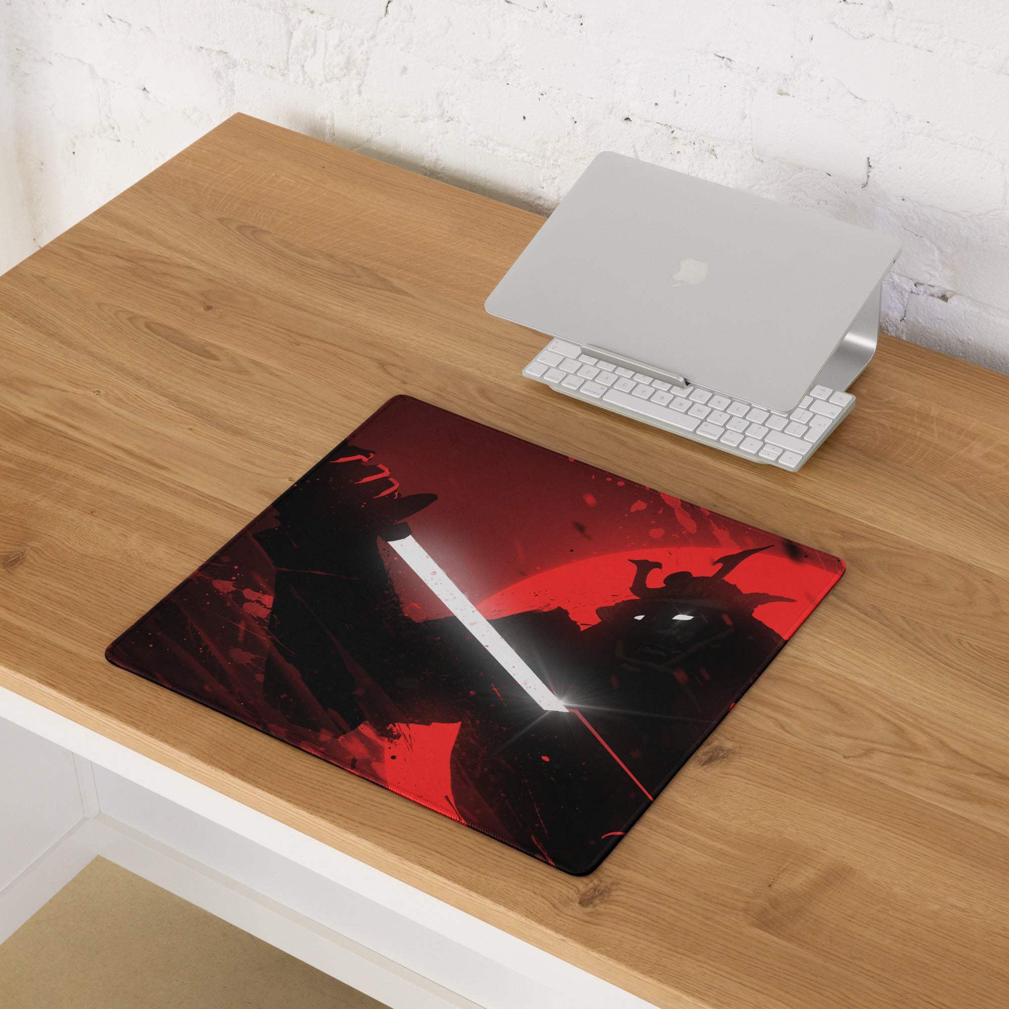 Red and black anime-themed samurai mousepad with glowing sword design on a modern abstract desk mat for gaming use