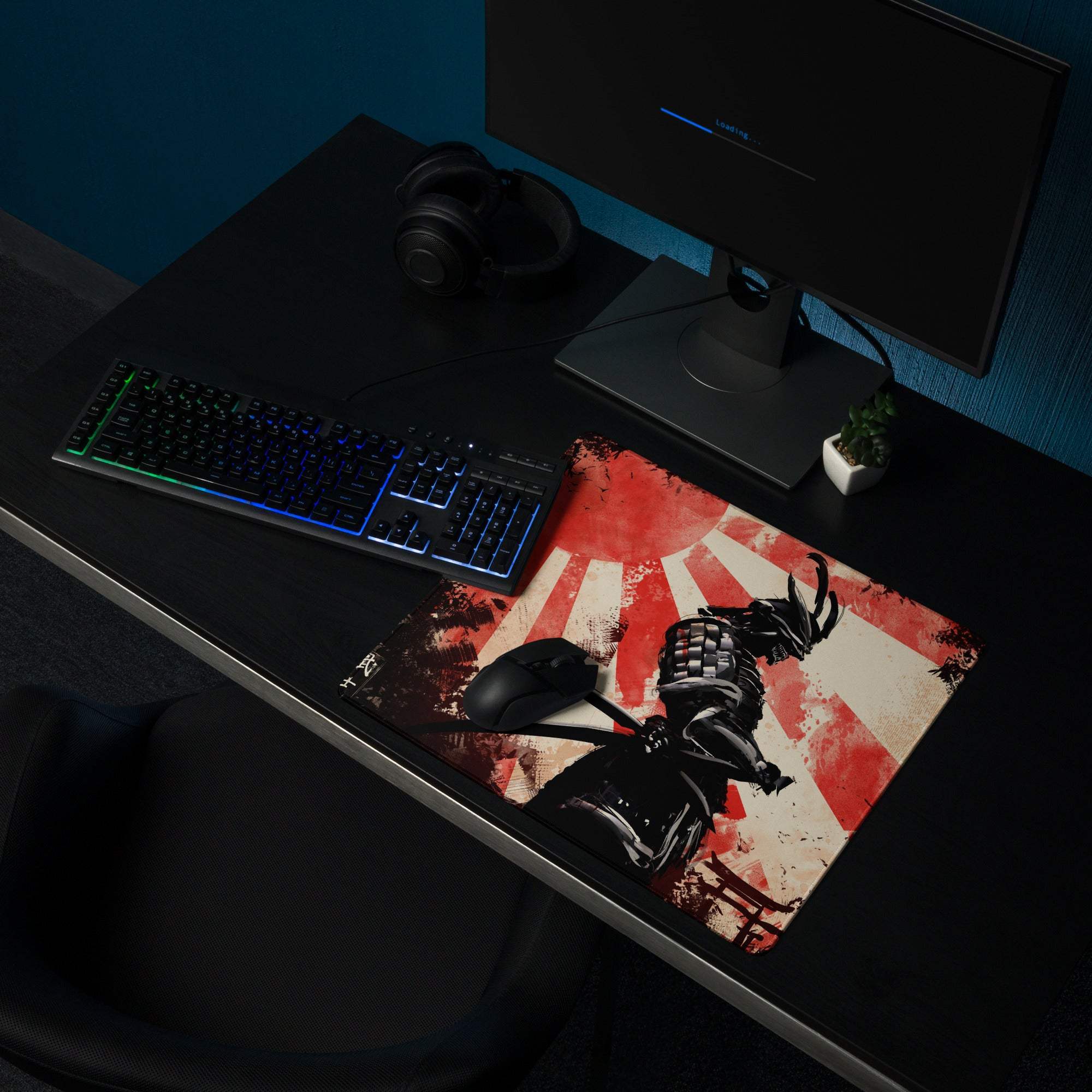 A rectangular gaming mousepad featuring a bold black samurai on a distressed red and white japanese flag design