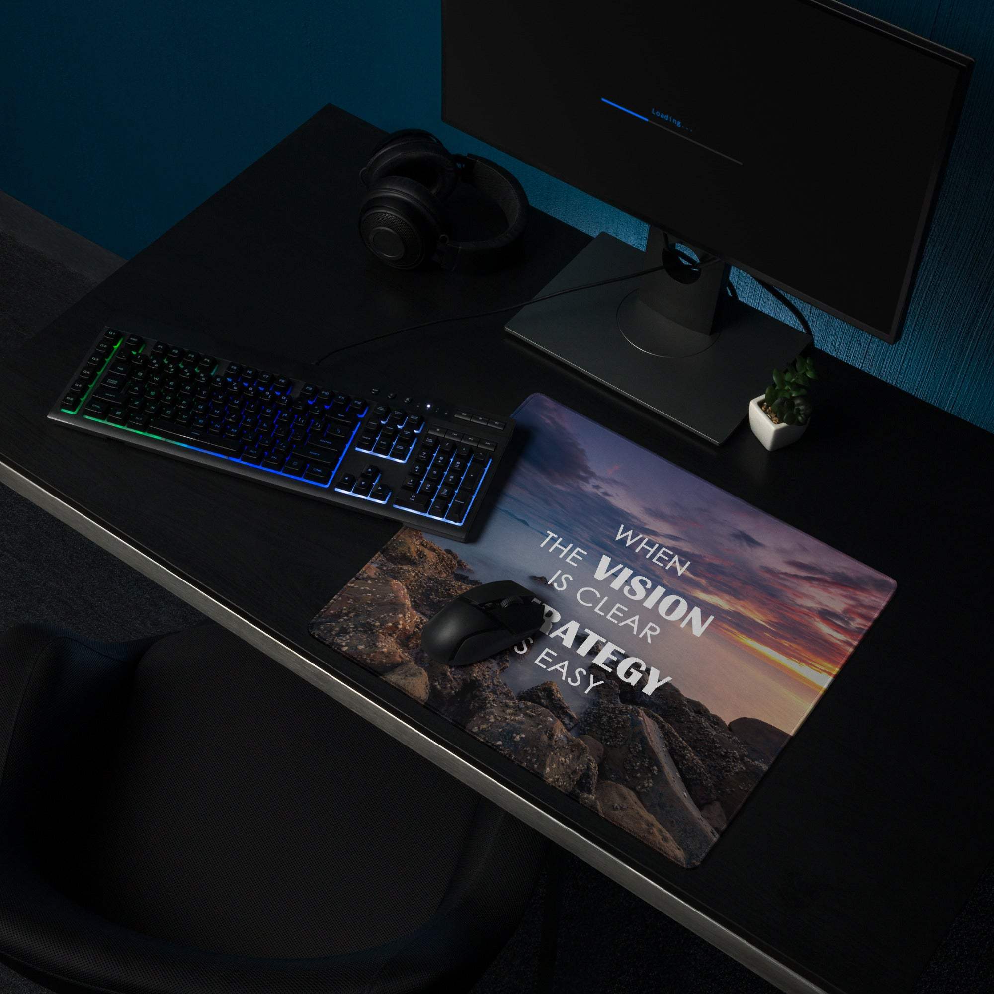 A rectangular polyester sunset purple blue gaming pad with a mountain landscape and motivational text for esports