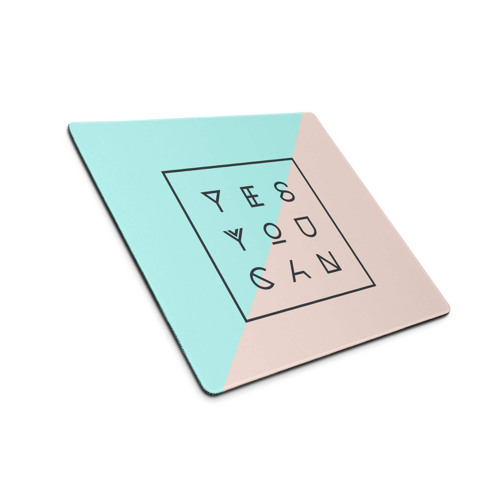 A square two-tone mint green and blush pink geometric coaster with yes you can phrase in black outlines