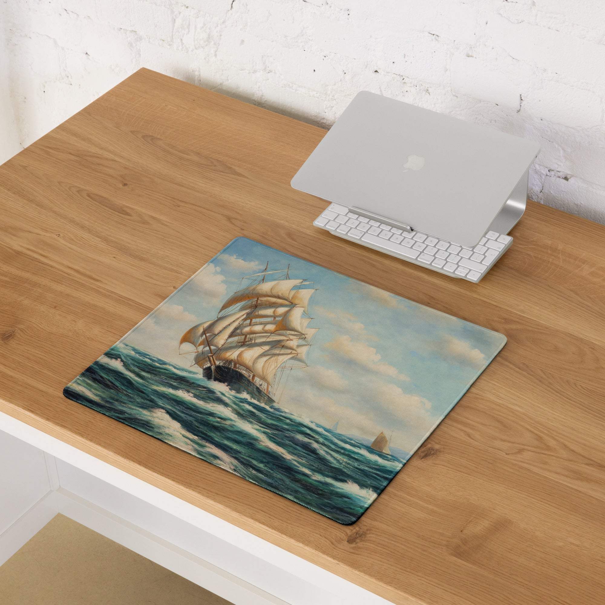Rectangular vintage maritime ship desk pad with detailed sailing ship illustration on blue white ocean waves