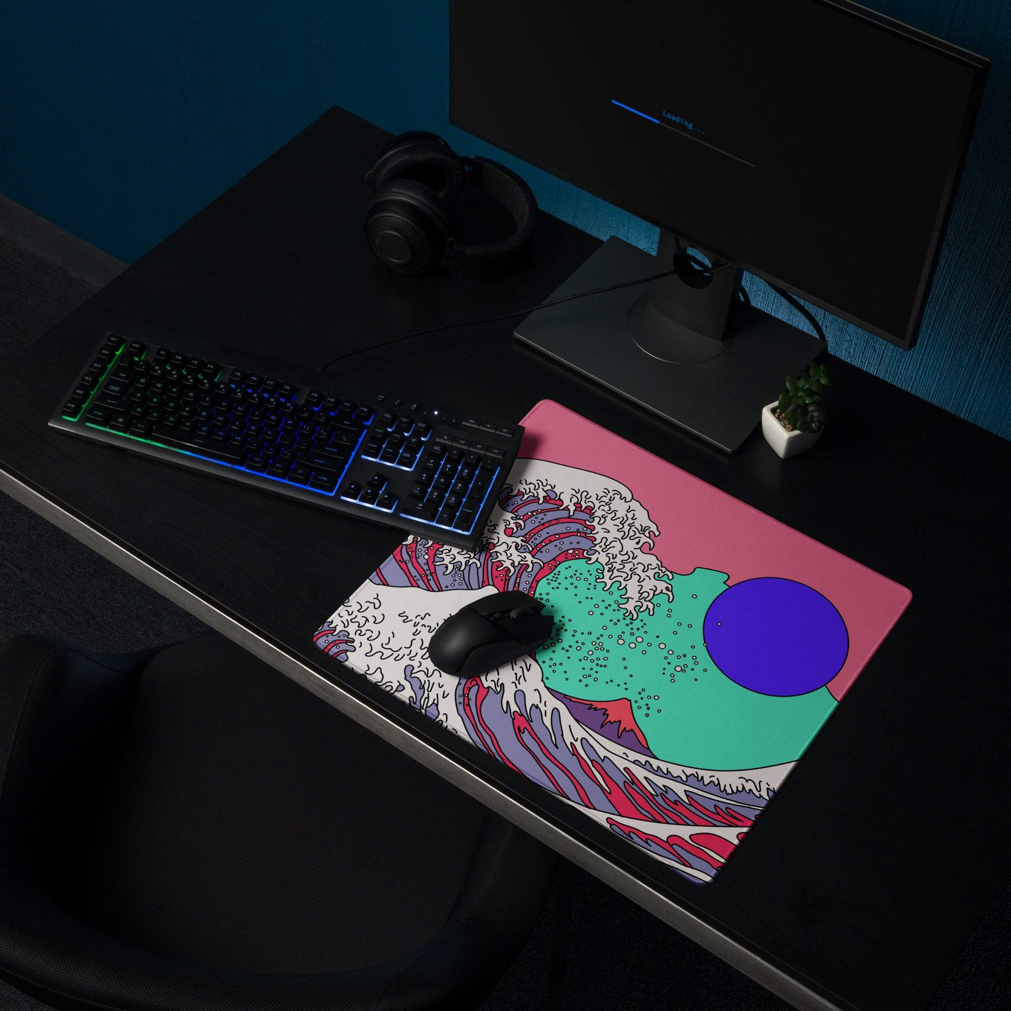 Vibrant pink wave pop art gaming mouse pad with teal wave pattern and bold purple circle featuring stylized ocean waves