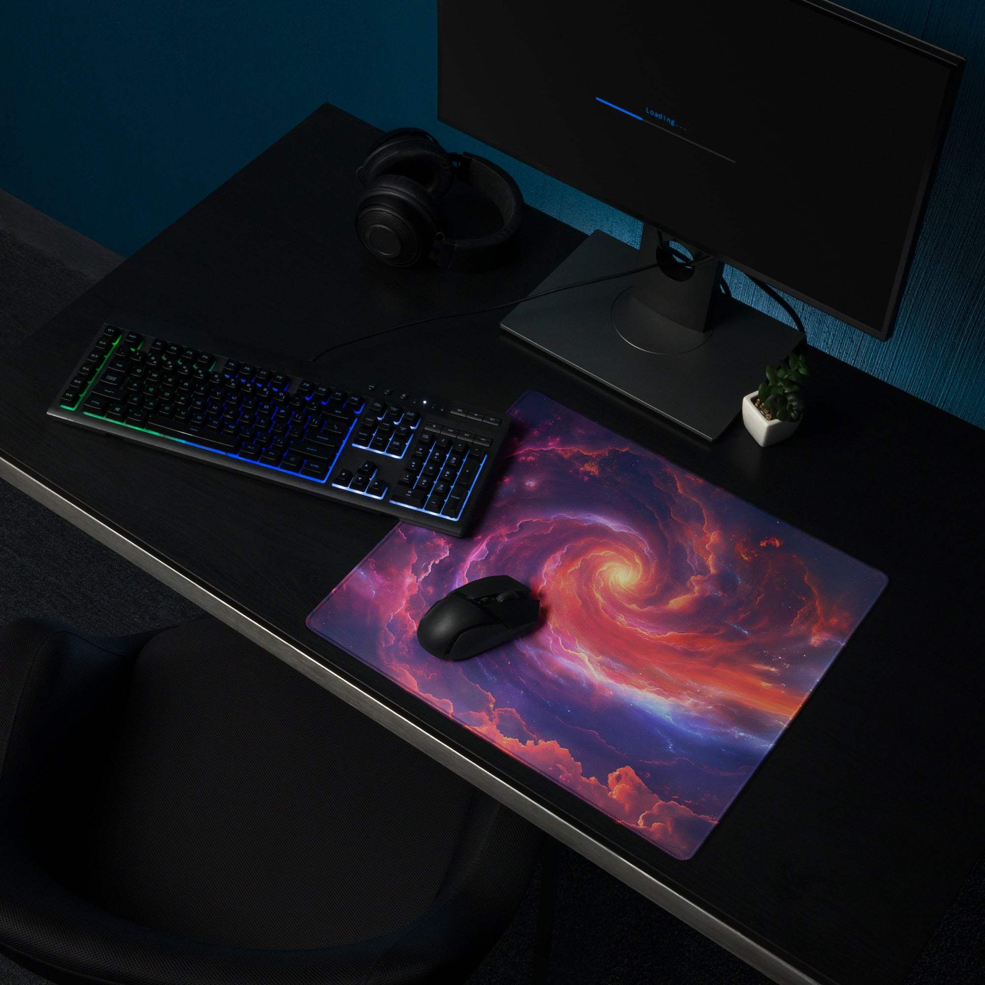 Cosmic nebula gaming mouse pad with glossy finish featuring vibrant purple pink and orange swirl on deep blue background