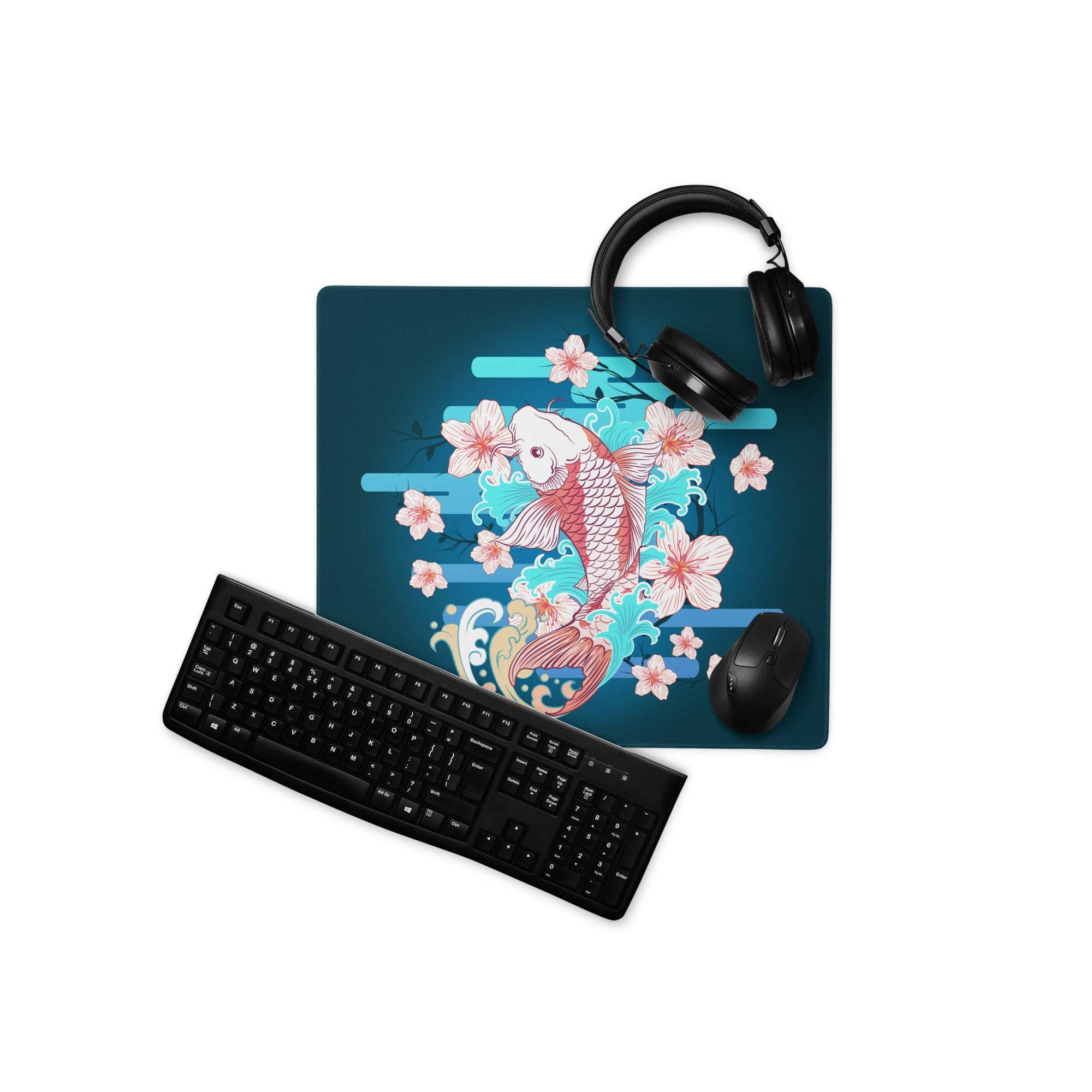 Teal gaming desk pad with vibrant pink and white koi fish and cherry blossoms on light blue striped background
