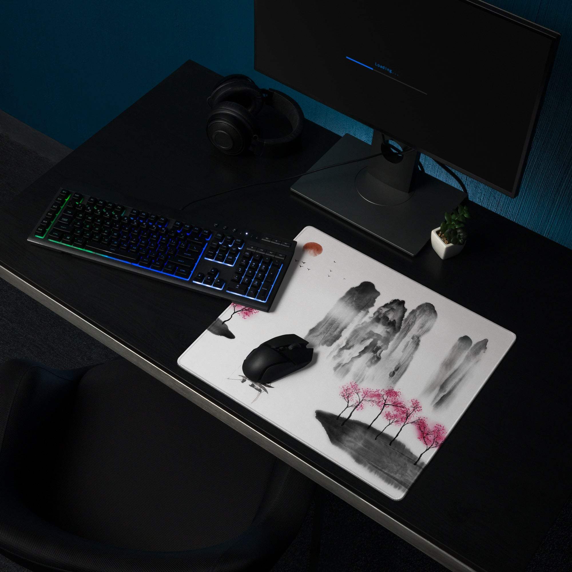 White mousepad with black and pink sumi-e landscape design featuring mountains trees and an orange sun
