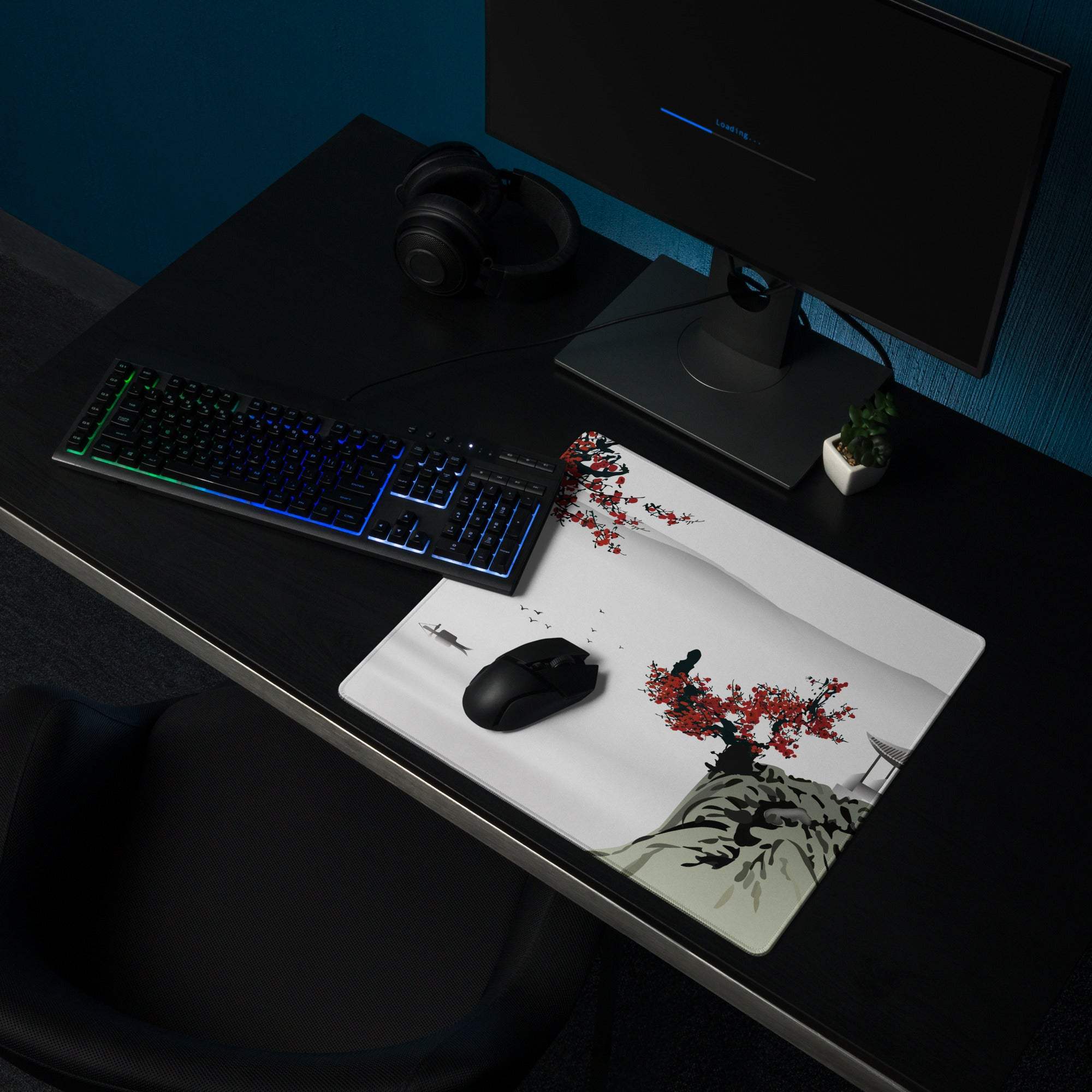 White rectangular gaming mouse pad with minimalist red blossom ink wash design and snowy traditional architecture background