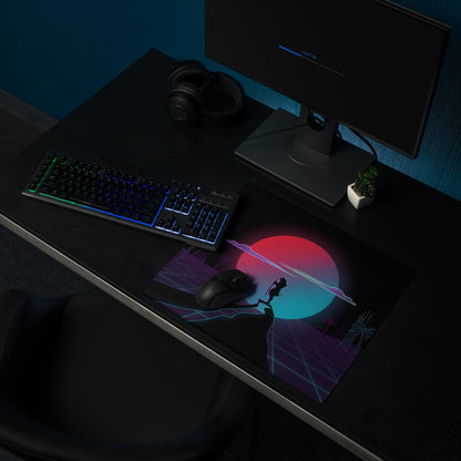 A sleek rectangular neon vaporwave gaming mouse pad with vibrant pink and blue gradients on black background