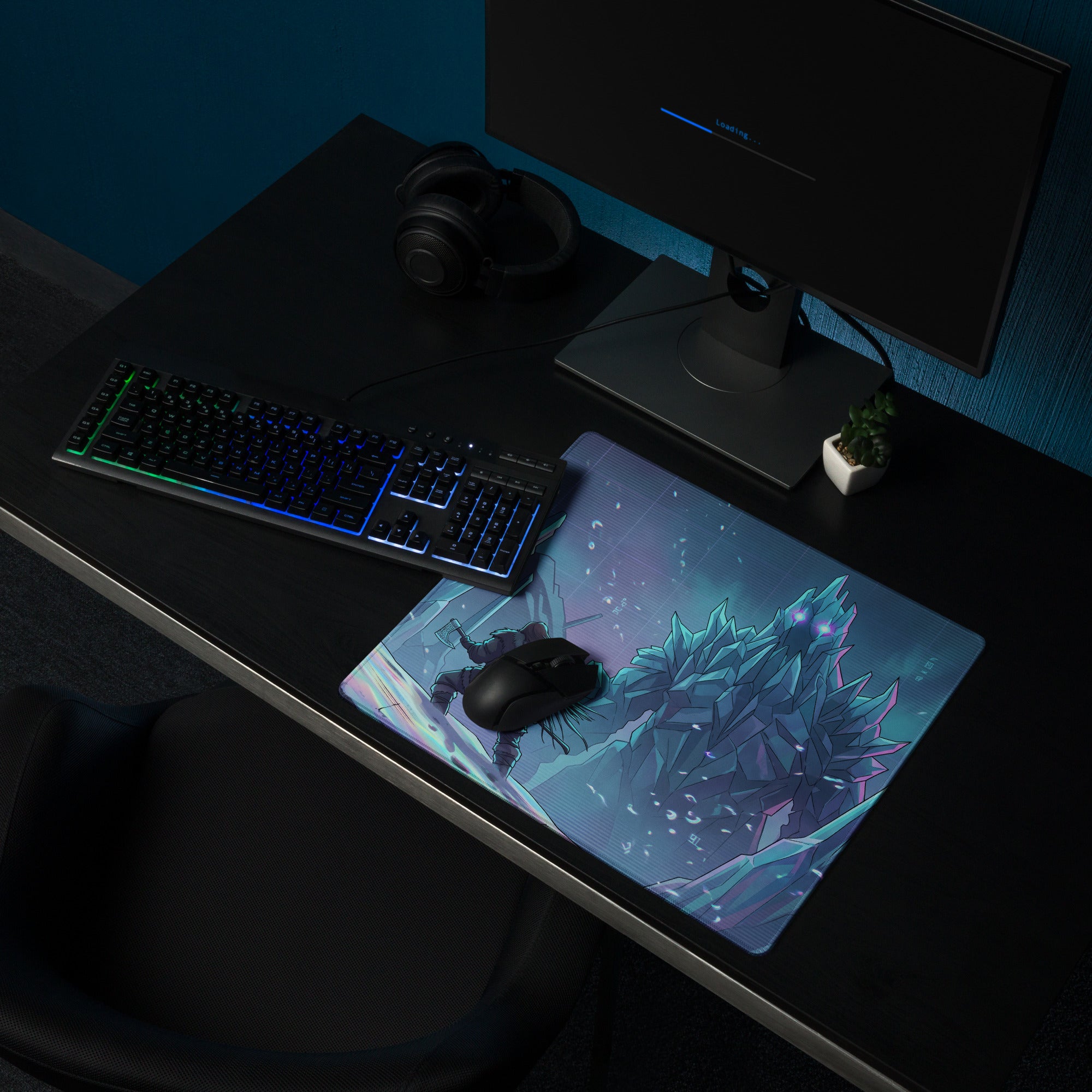 A rectangular gaming mousepad with a vibrant godzilla illustration in blue cyan and purple neon hues
