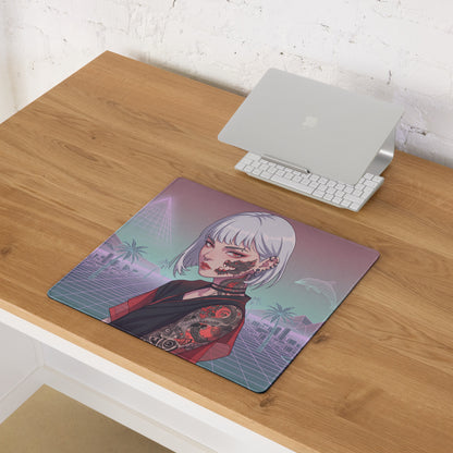 Vaporwave neon desk pad with soft-touch surface featuring a cyberpunk woman purple pink teal cityscape design