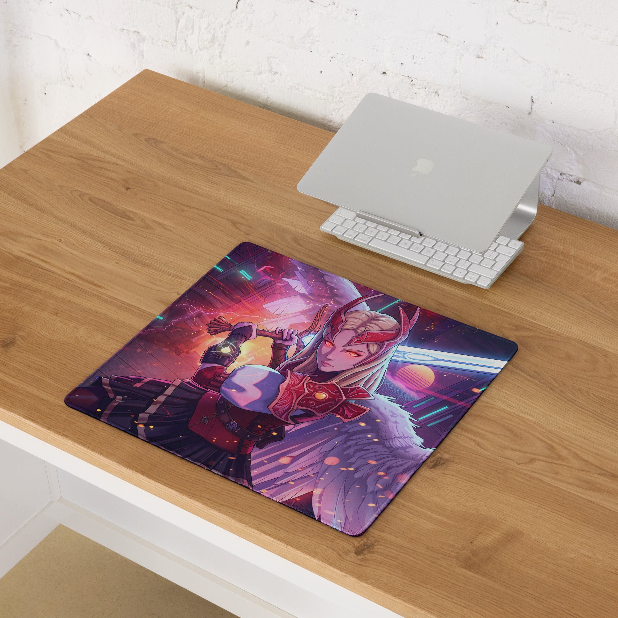 Vibrant purple and red vaporwave neon valkyrie gaming mouse pad with fantasy warrior wings on wooden desk