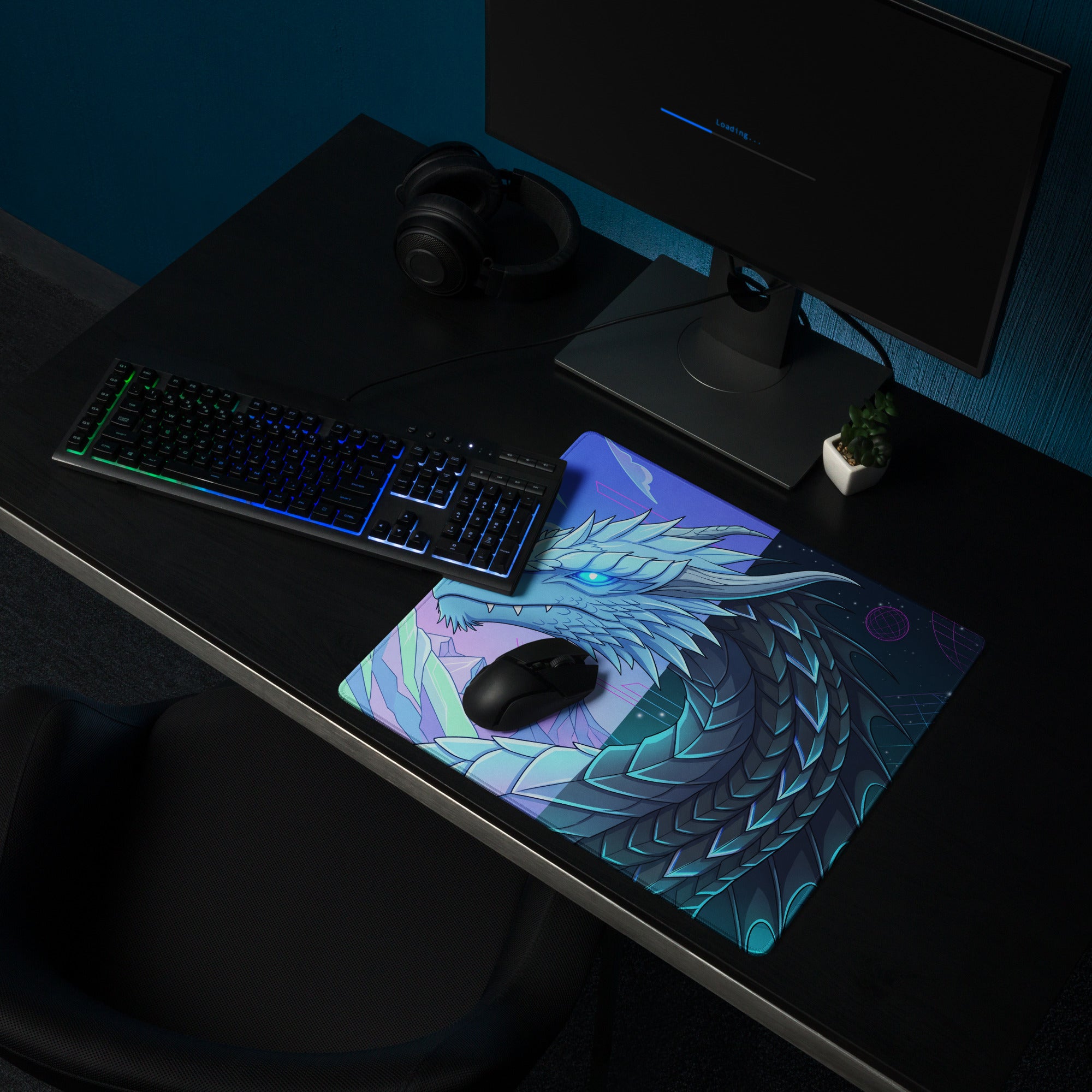 A vibrant rectangular gaming mousepad with a detailed blue and teal dragon illustration and glowing eyes for vaporwave gaming