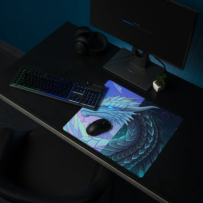 A vibrant rectangular gaming mousepad with a detailed blue and teal dragon illustration and glowing eyes for vaporwave gaming