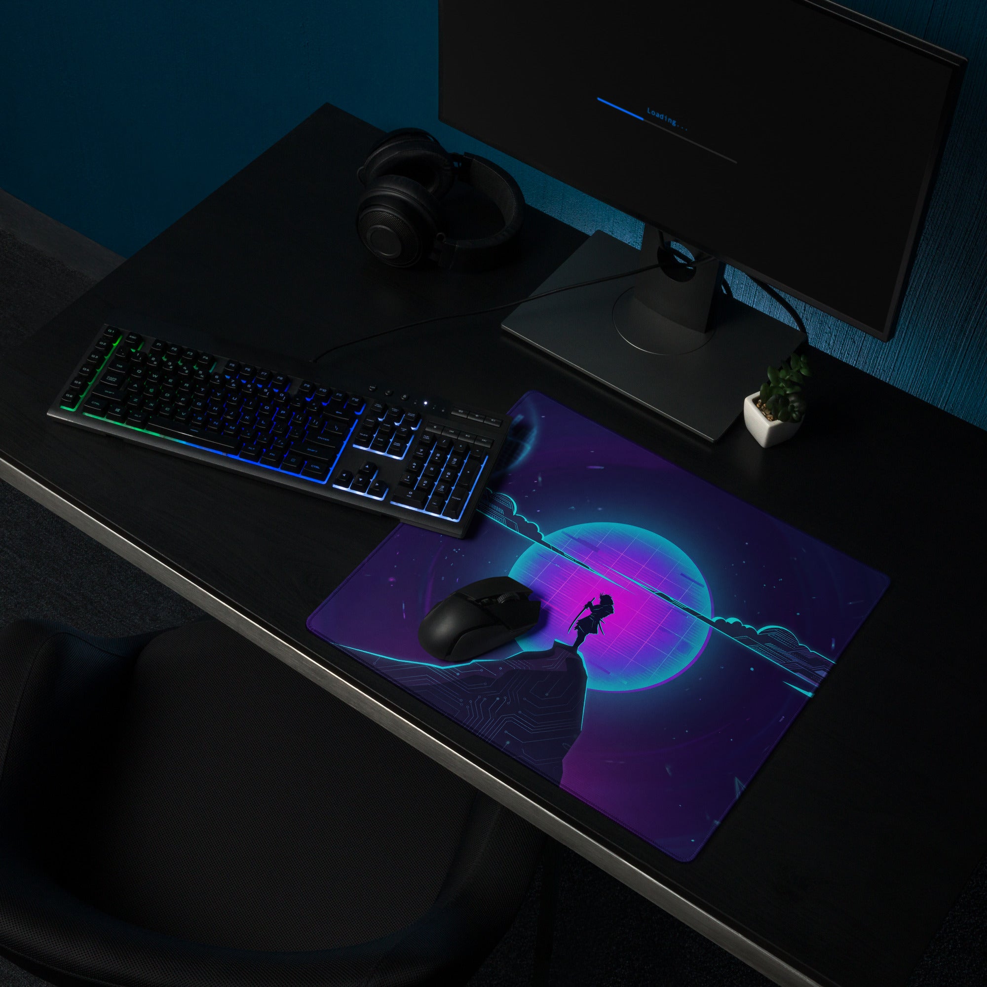 Vaporwave neon gaming mouse pad in purple and cyan with cosmic design and silhouette figure on large desk mat