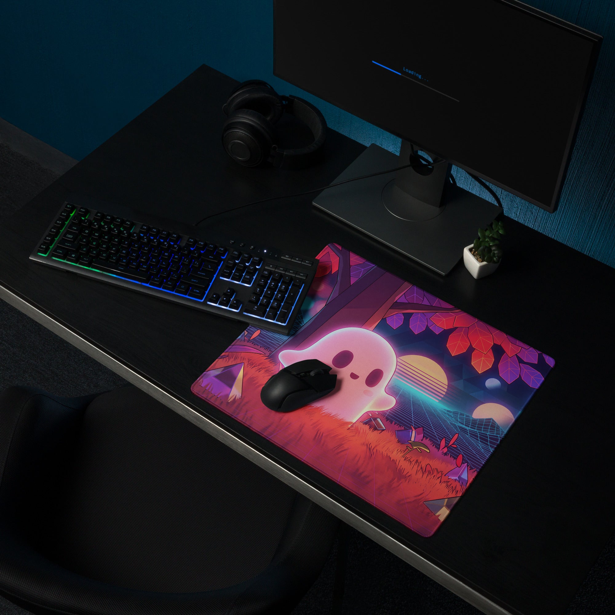 Vaporwave neon ghost desktop mouse pad with vibrant pink ghost and neon purple orange forest design on fabric surface