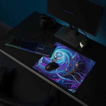 Vibrant purple and blue neon vaporwave sorceress gaming mouse pad with fantasy warrior illustration on dark desk setup