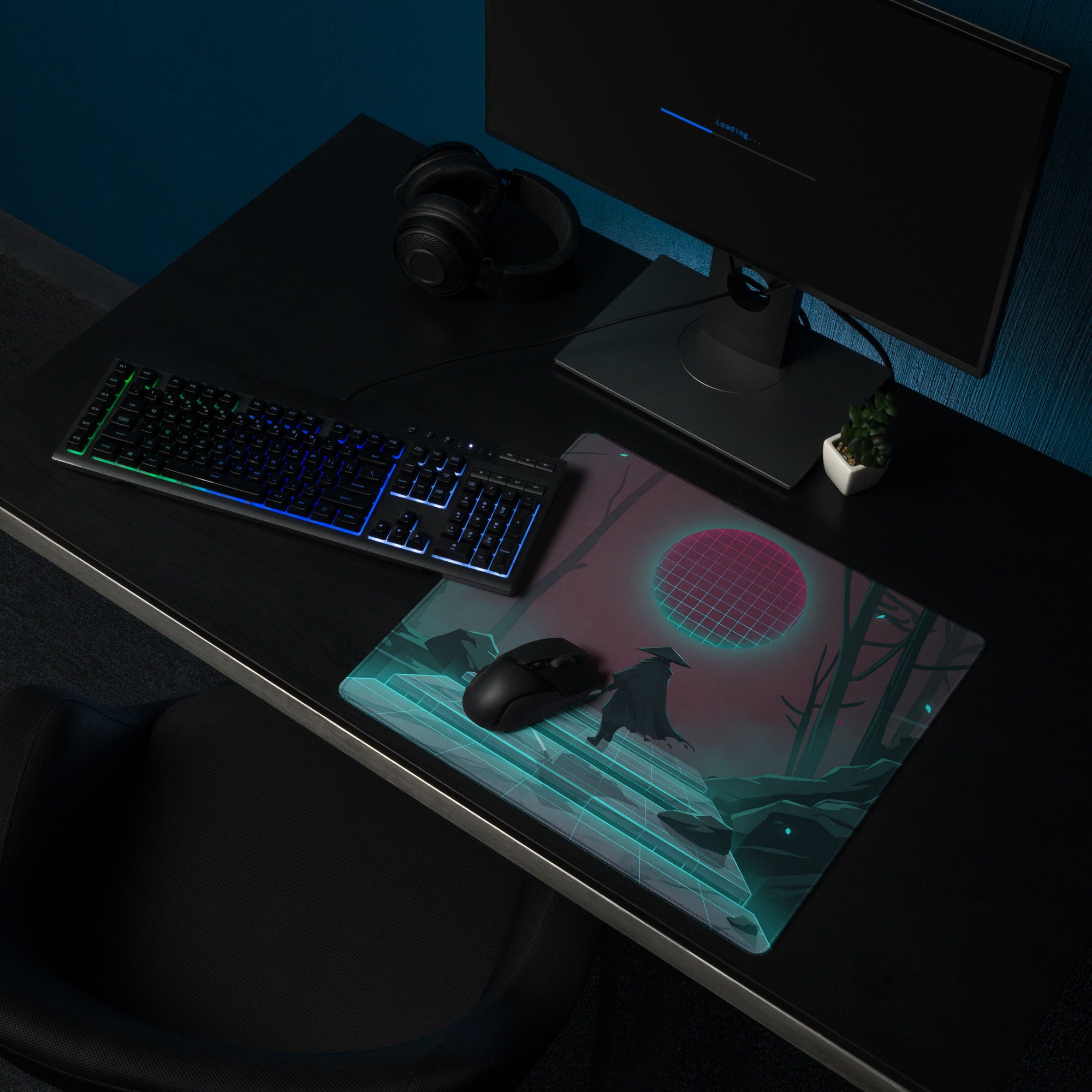 A sleek rectangular gaming mousepad with vibrant neon pink sun and teal geometric vaporwave design for desk use