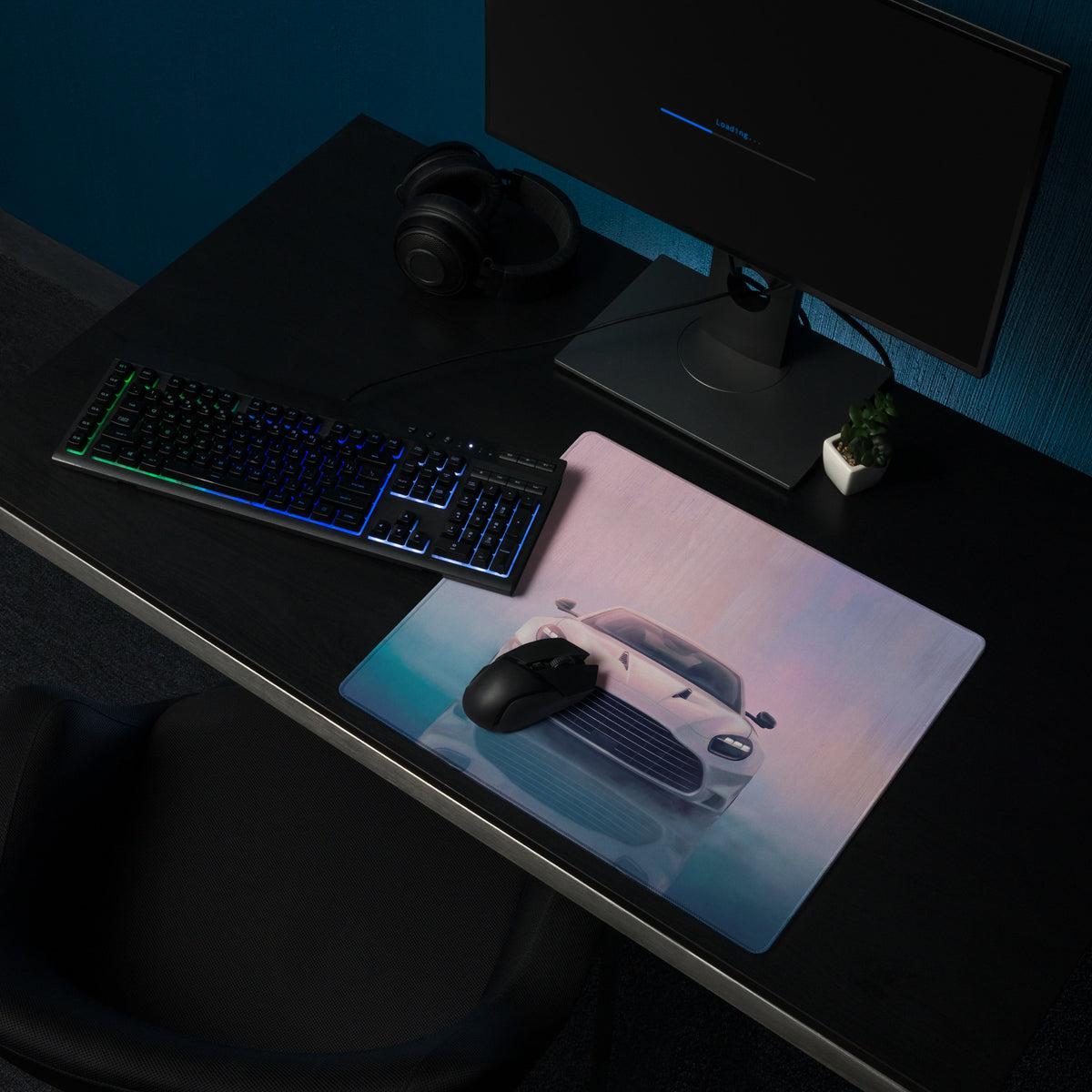 A sleek rectangular ultra-glide stitched edge gaming mousepad with a pearl white aston martin vantage graphic