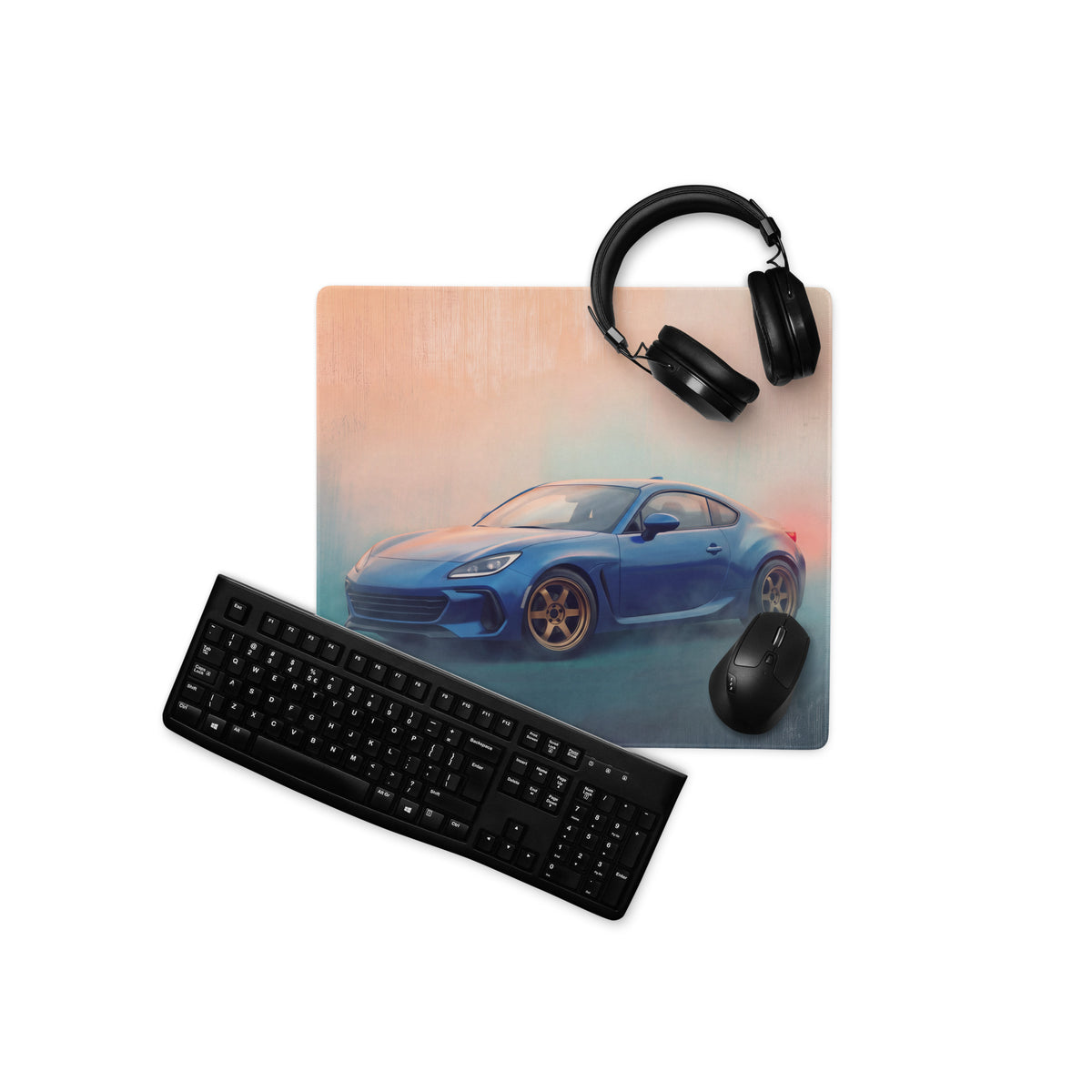 Blue sports car graphic printed on a rectangular non-slip desk pad inspired by subaru brz world rally blue bronze rim