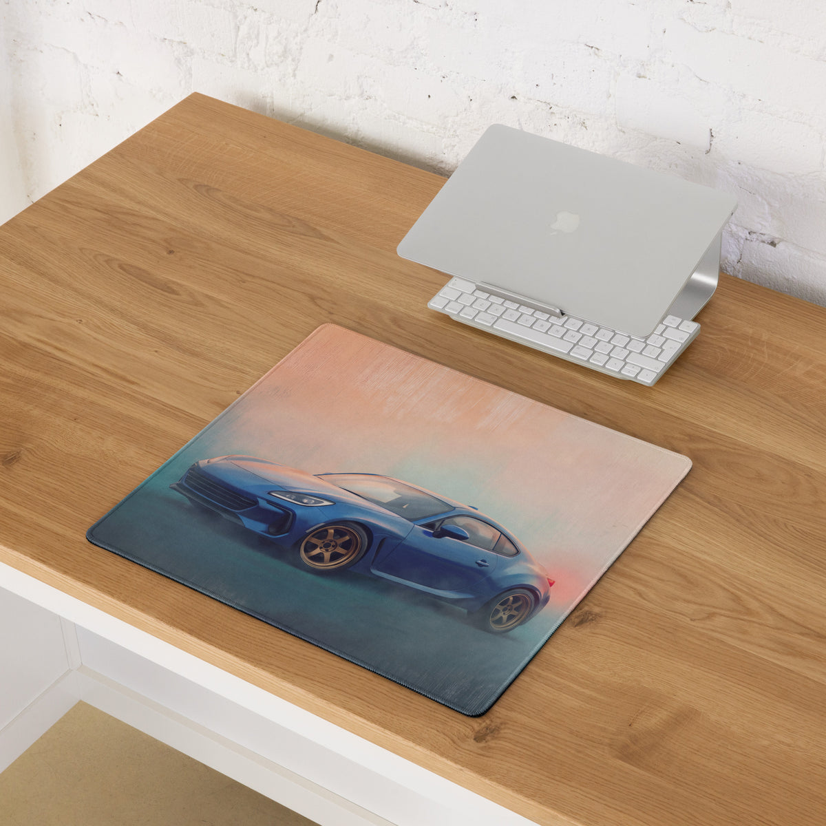 Blue sports car illustration desk pad featuring Subaru BRZ inspired World Rally blue bronze rim design non-slip material