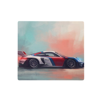 Vibrant red white and blue porsche racing car illustration on a square coaster featured on porsche 911 heritage livery desk mat