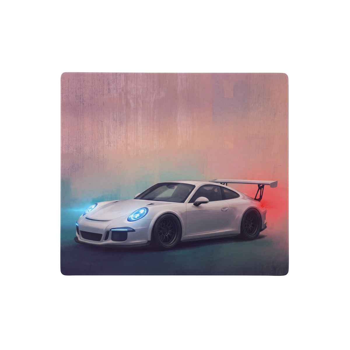 White Porsche 911 gt3 rs sports car with rear wing and blue headlights on a pure white stitched edge desk pad surface