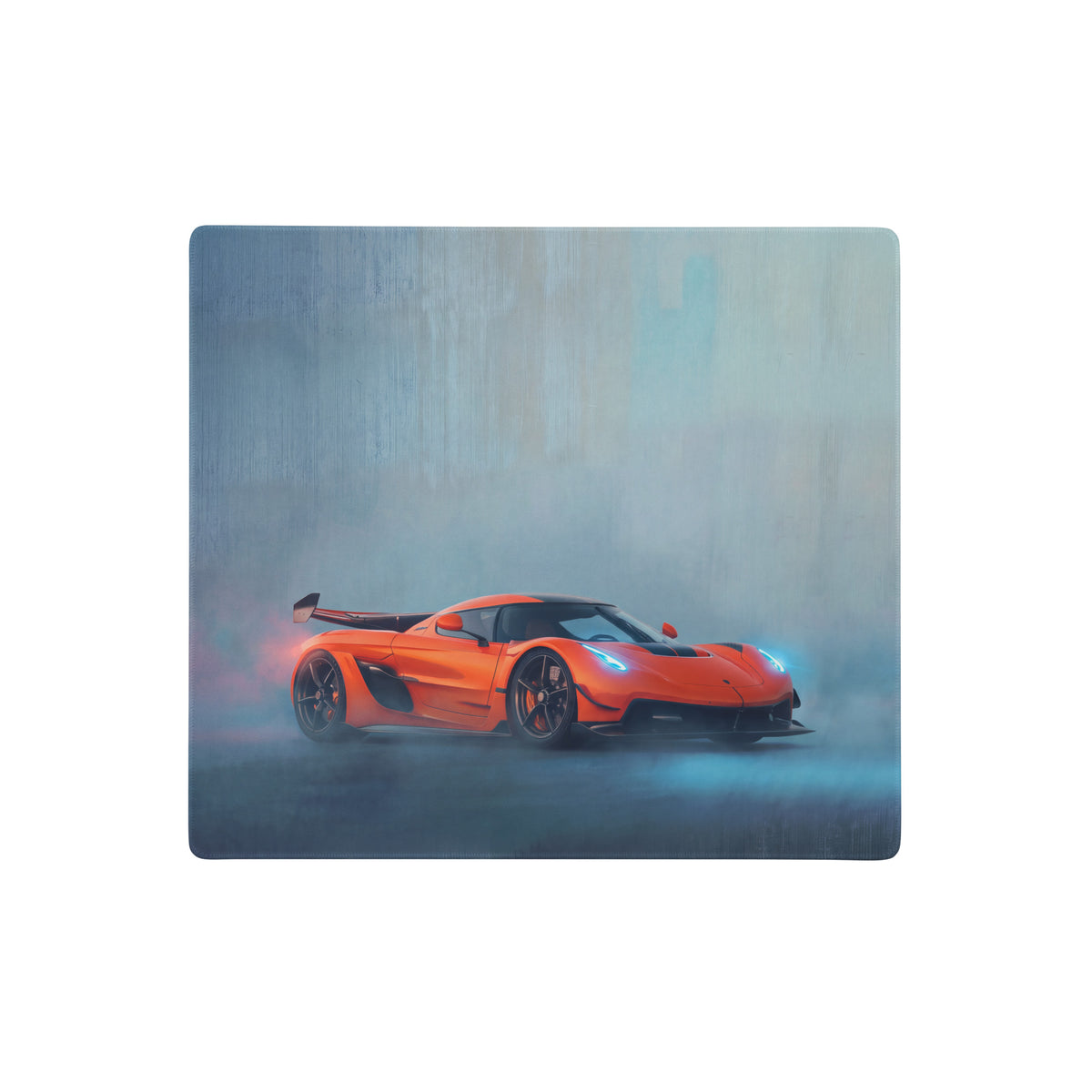 Koenigsegg jesko inspired tangelo drift desk pad with vibrant orange hypercar design and ultra-glide stitched edge