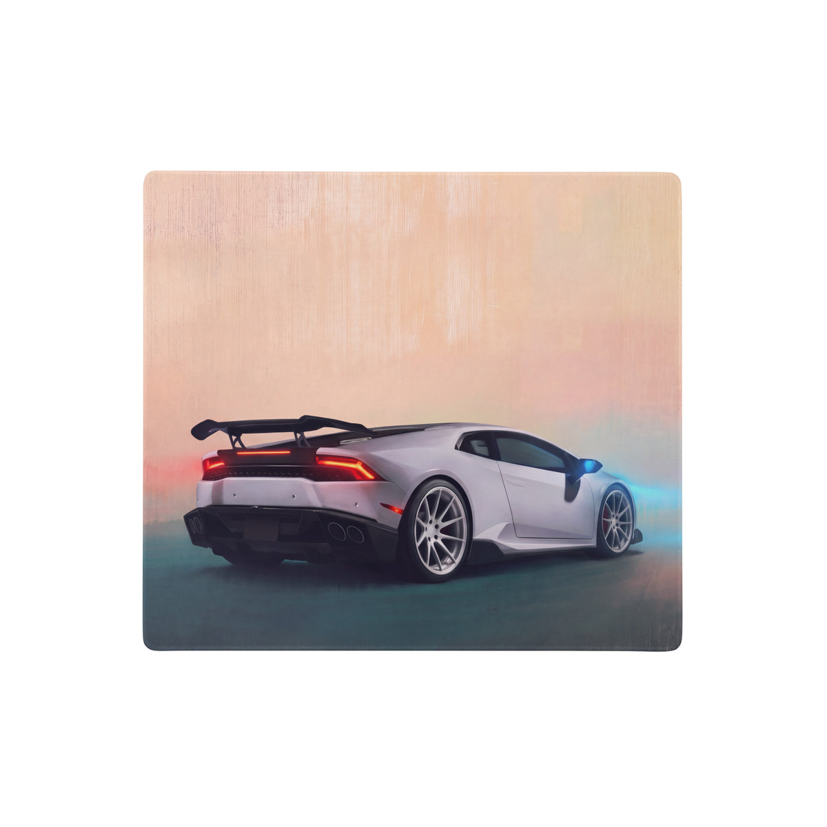 Silver Lamborghini Huracán inspired pearl apex extended wooden desk pad with glowing red taillights and blue lighting