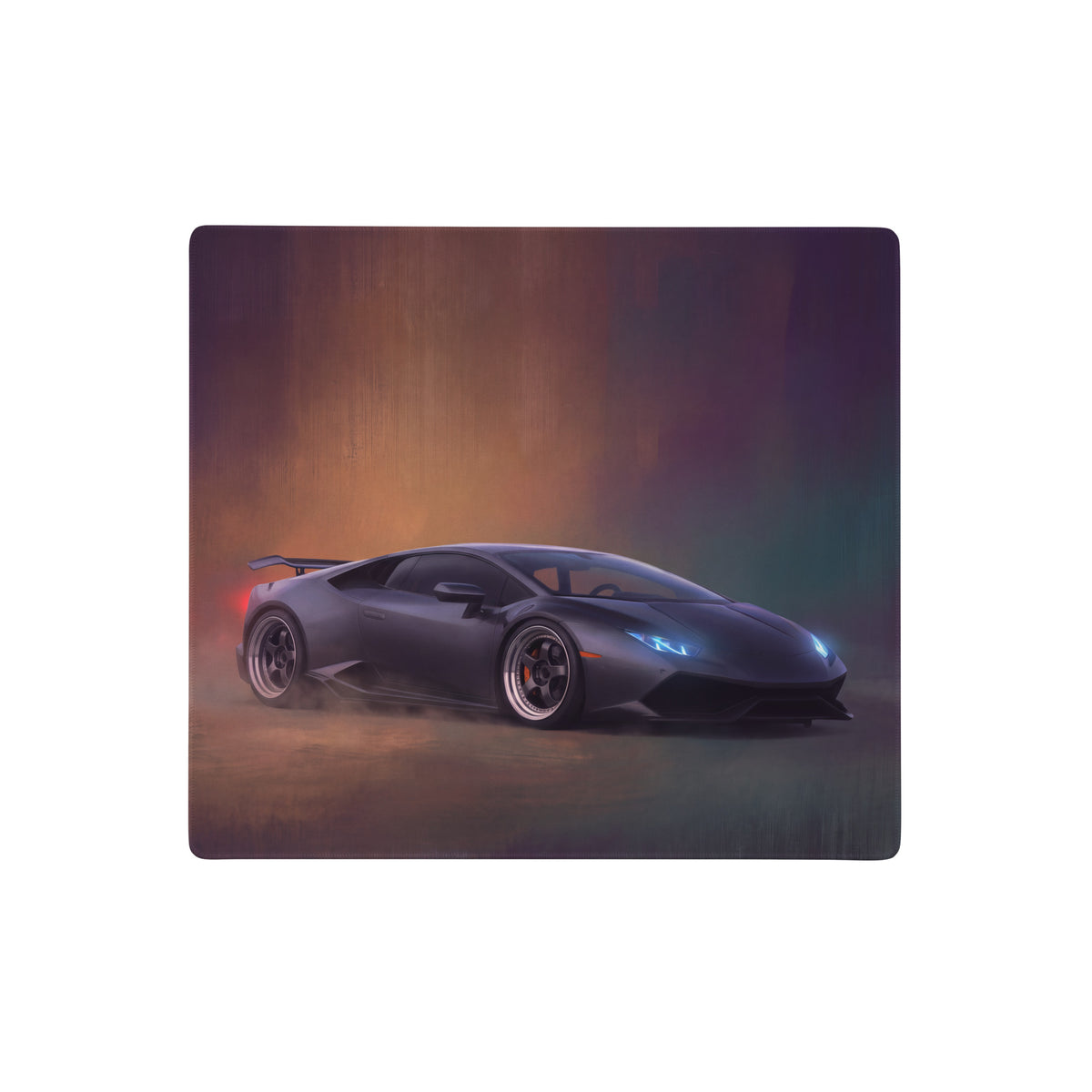 Dark gray lamborghini huracán inspired stealth onyx desk pad with stitched edge featuring a blue headlight drift design