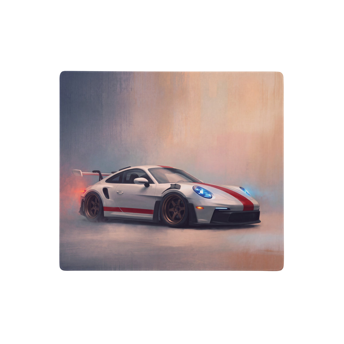 White Porsche 911 GT3 with red racing stripes and glowing blue headlights on Porsche 911 GT3 RS inspired heritage red stripe desk pad