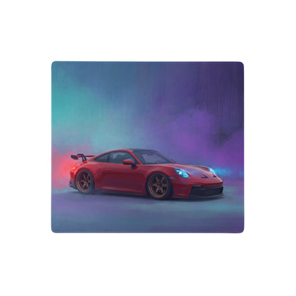 Red porsche 911 sports car with glowing blue headlights on a crimson drift desk pad extended non slip mouse mat
