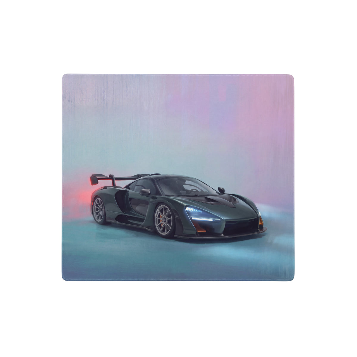 Black McLaren Senna stylized painting with glowing red and blue accents on McLaren Senna inspired racing green desk pad
