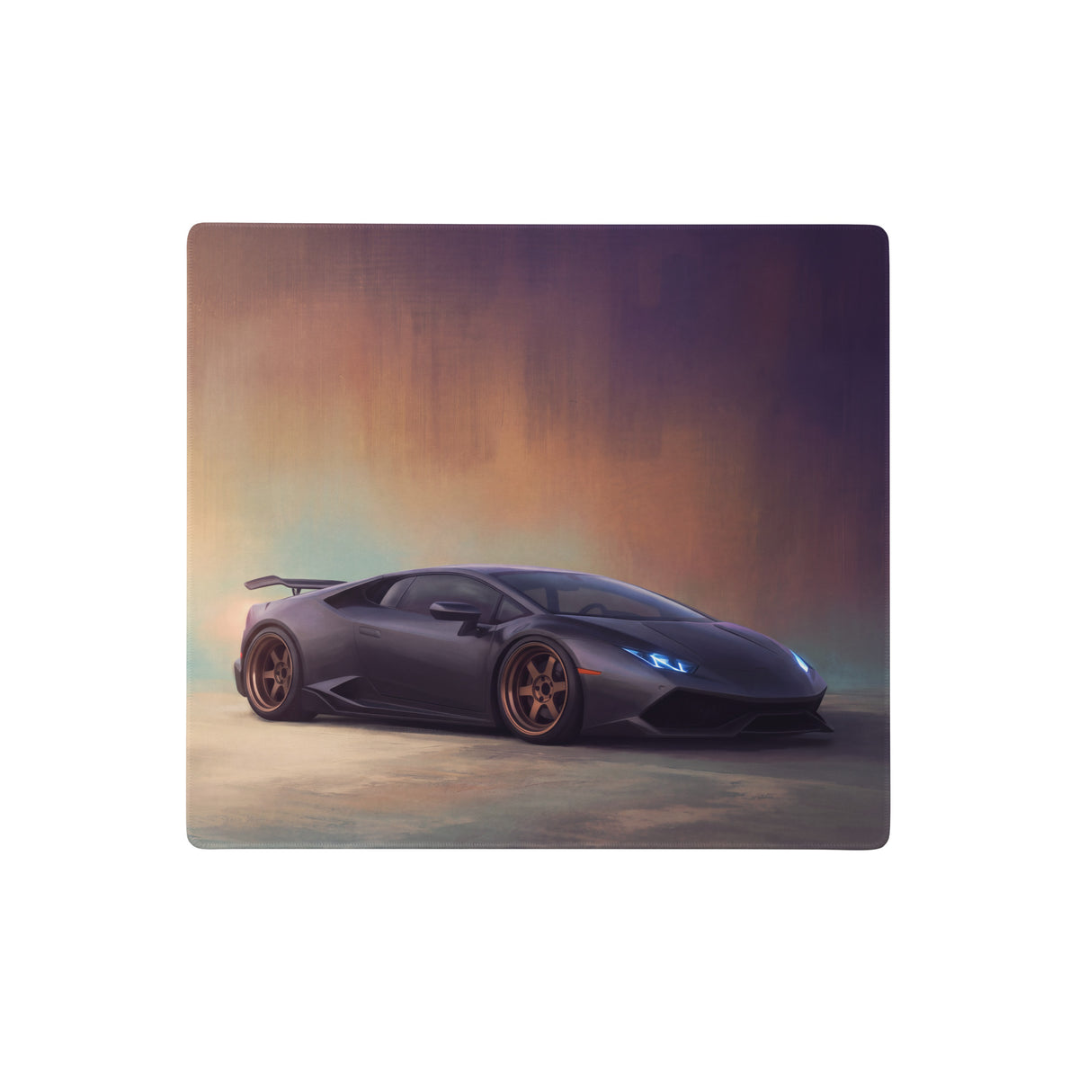 Lamborghini huracán inspired matte graphite desk mat featuring a black huracán with blue headlights and bronze wheels