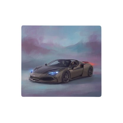 A sleek matte gray ferrari 296 gts inspired titanium edition desk mat with glowing blue headlights and red taillight design