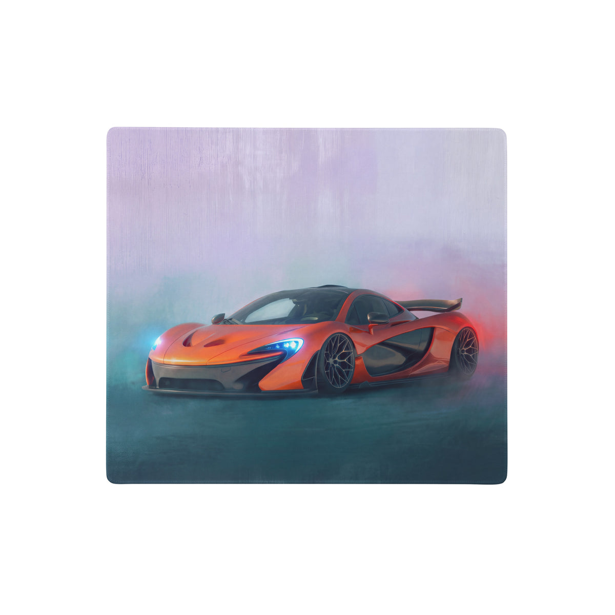 Vibrant orange McLaren P1 sports car graphic printed on sleek brushed metal extended desk pad with non-slip rubber base