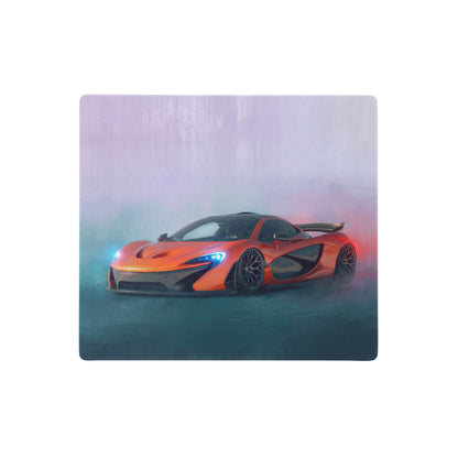Vibrant orange McLaren P1 sports car graphic printed on sleek brushed metal extended desk pad with non-slip rubber base
