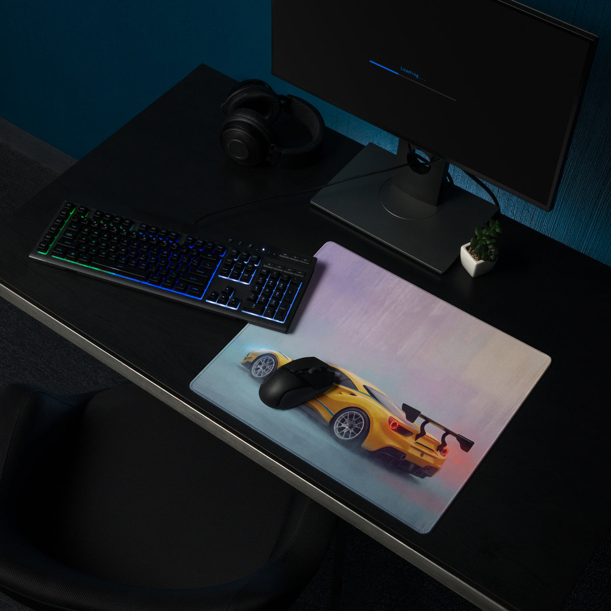 Yellow Ferrari 488 GT3 inspired motorsport desk mat with non-slip rubber base and black computer mouse on top