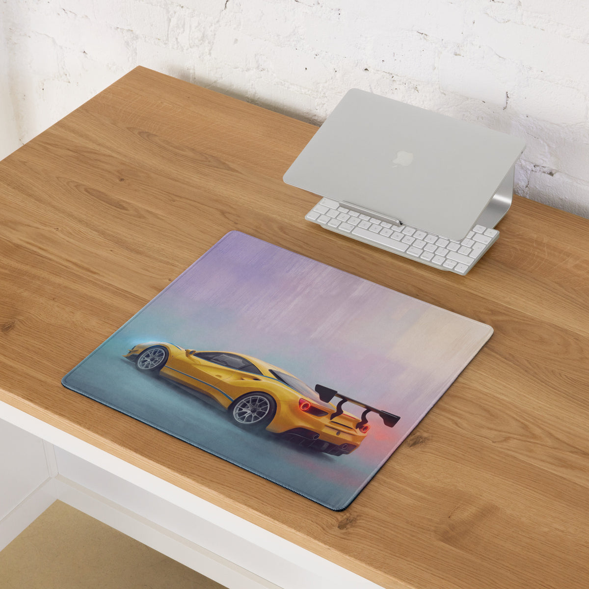 Yellow Ferrari 488 GT3 inspired motorsport desk mat with soft edges non slip rubber base and subtle gradient background