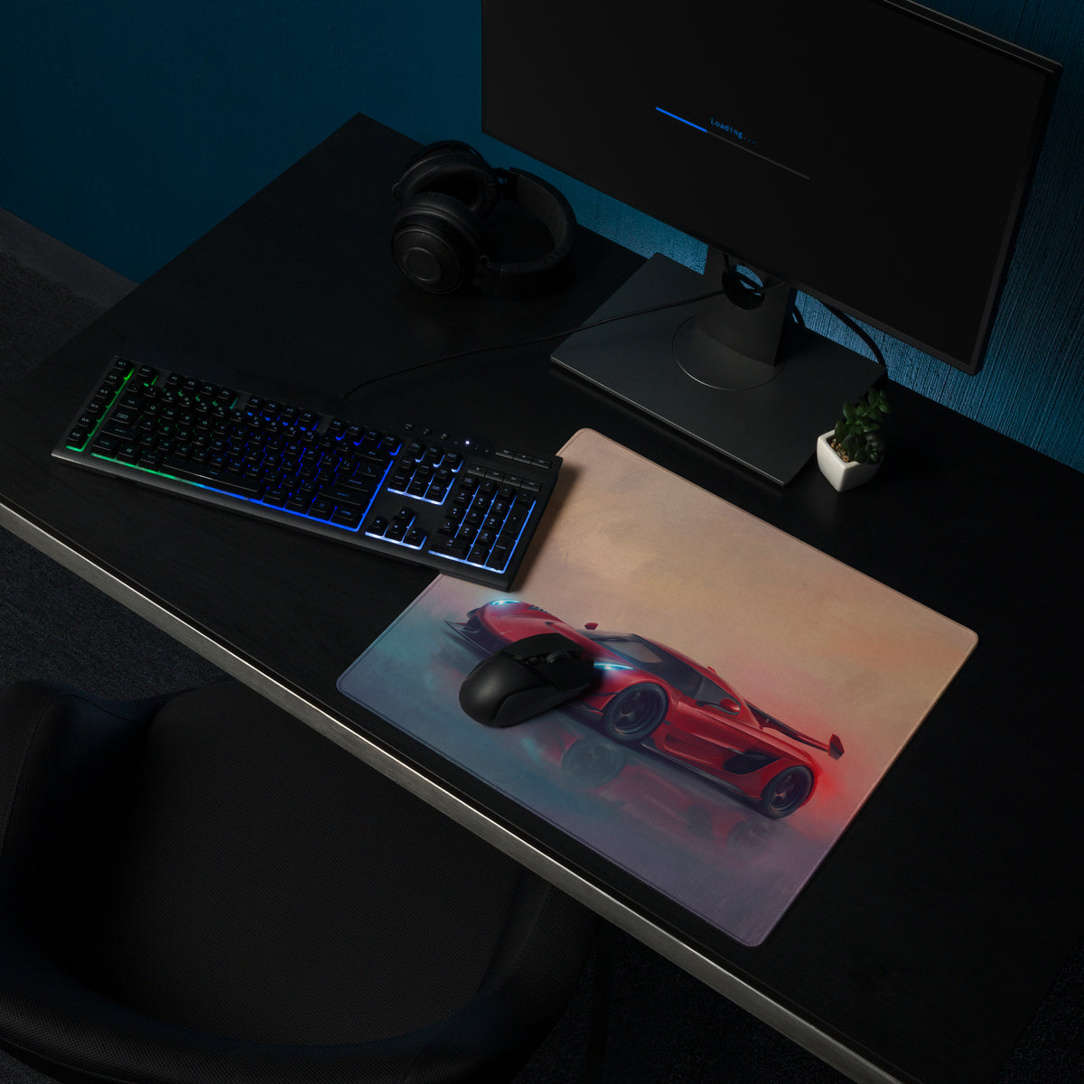 Koenigsegg jesko inspired cherry red desk pad with red and black sports car graphic on a rectangular ultra-glide xl mouse mat