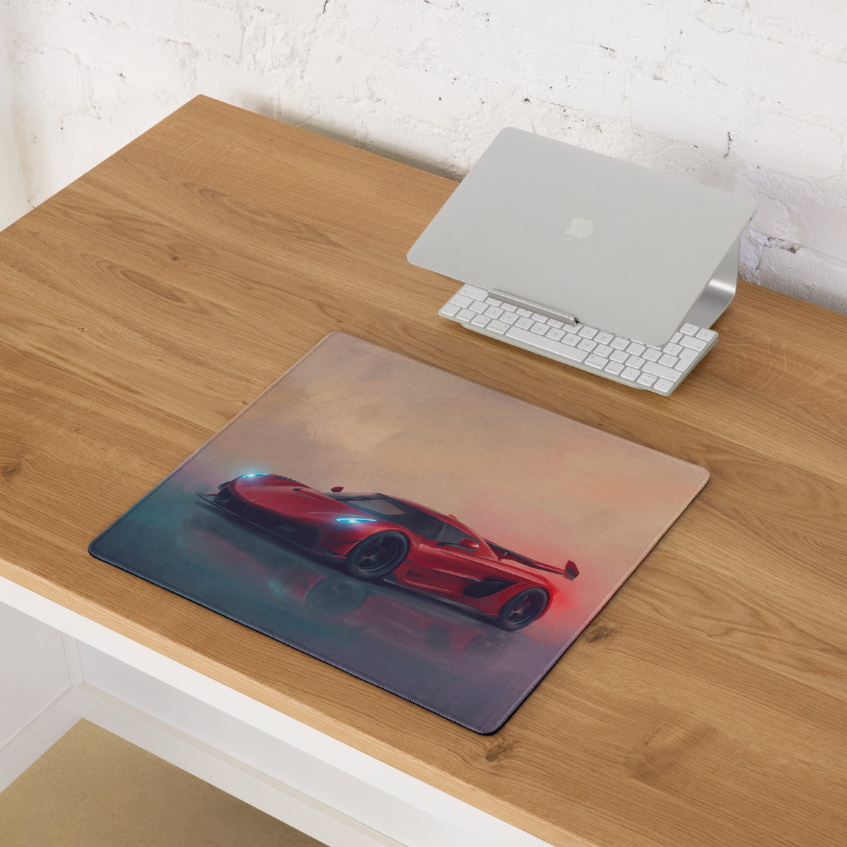 Koenigsegg jesko inspired cherry red desk pad featuring a red sports car graphic on a transparent gaming mouse mat