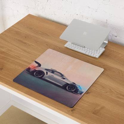 A sleek rectangular stitched edge xl gaming mouse mat featuring a silver Porsche 911 GT3 RS inspired sports car graphic