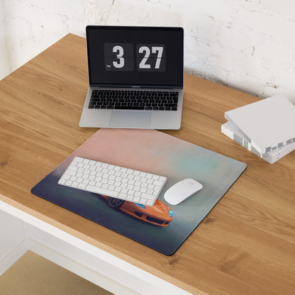 Porsche Carrera GT inspired Arancio edition desk mat featuring an orange sports car graphic on a gradient cloth mousepad